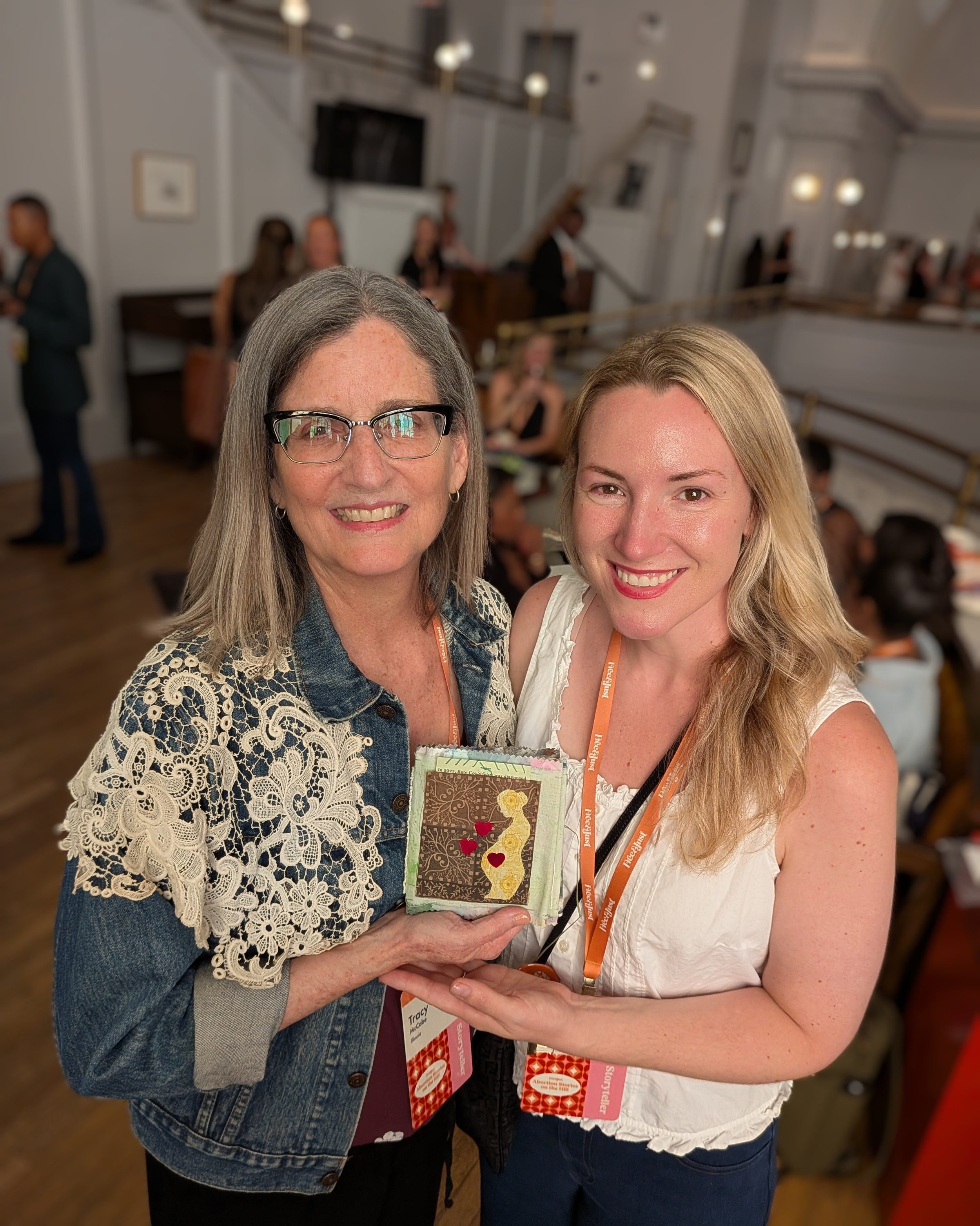 Kate Cox and I hold book with her story