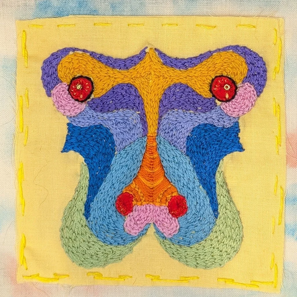 Colorful abstract design that resembles female reproductive organs
