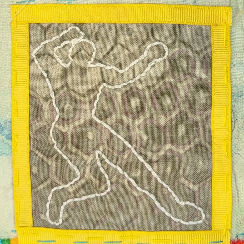 White chalk outline of body on grey background, as at a crime scene