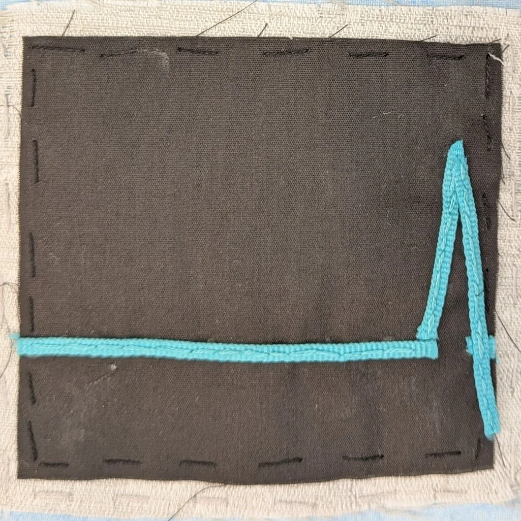 EKG machine showing one heartbeat