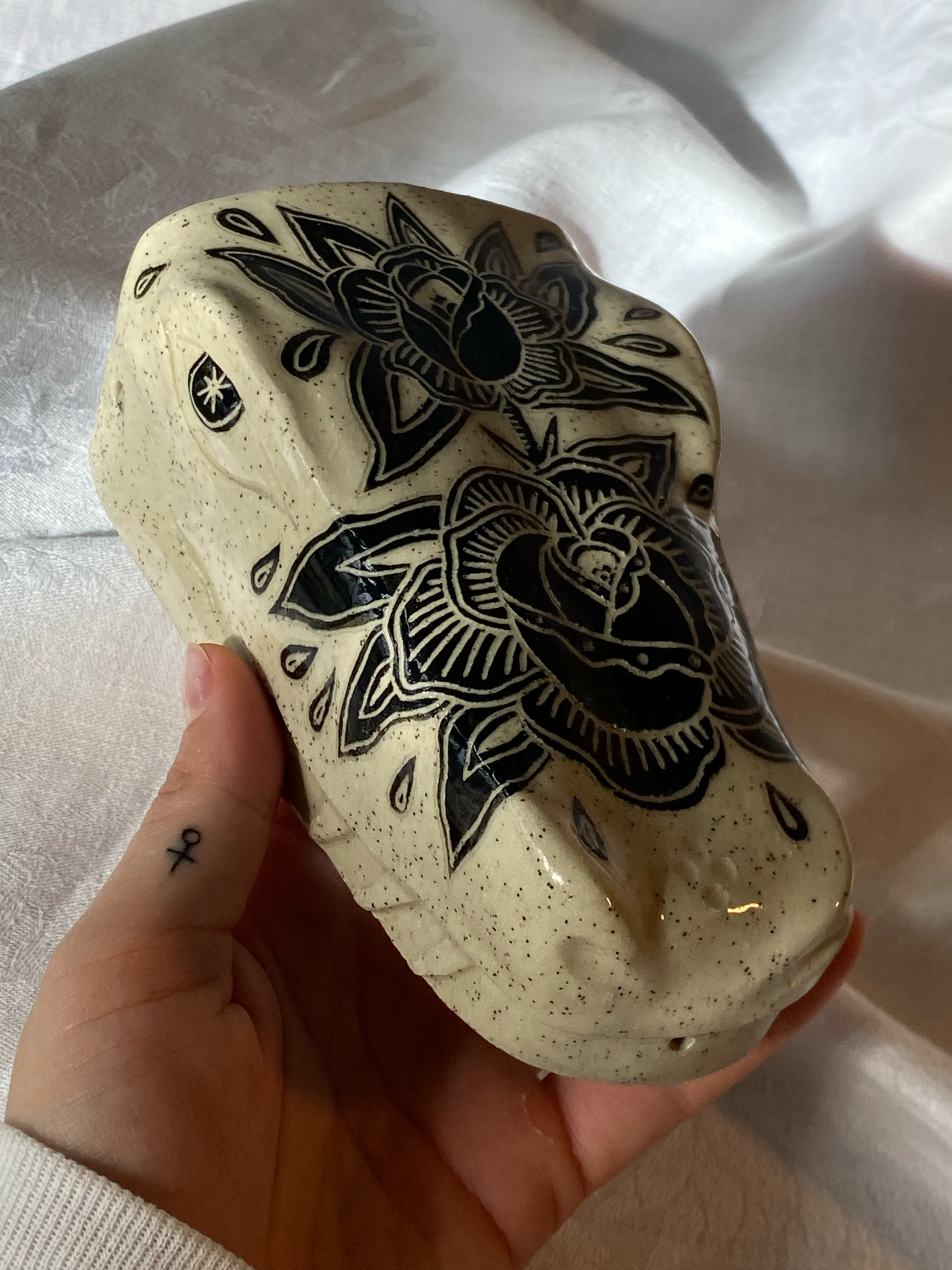 Untitled, 2025.
Stoneware clay, underglaze, clear glaze.