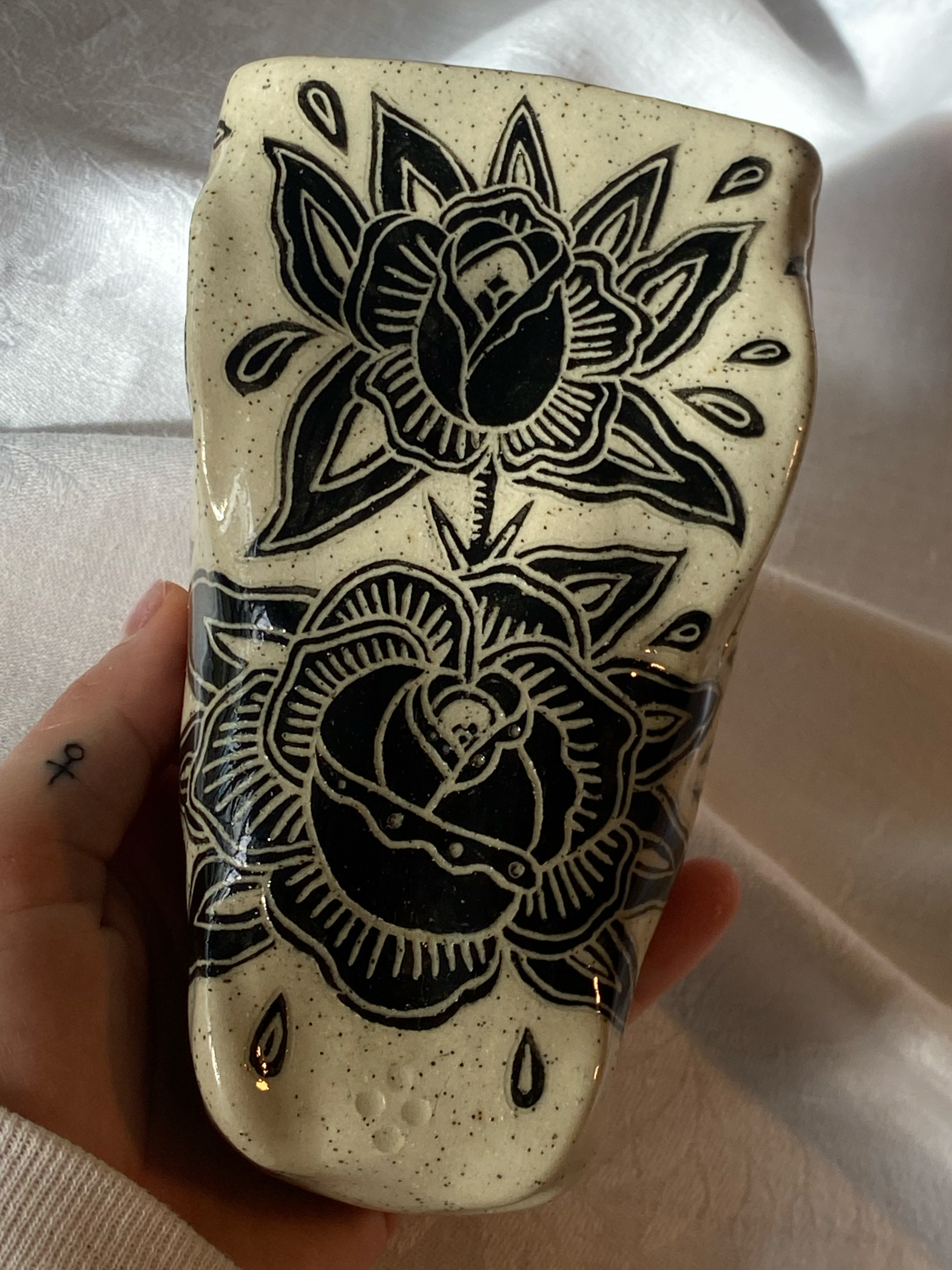 Untitled, 2025.
Stoneware clay, underglaze, clear glaze.