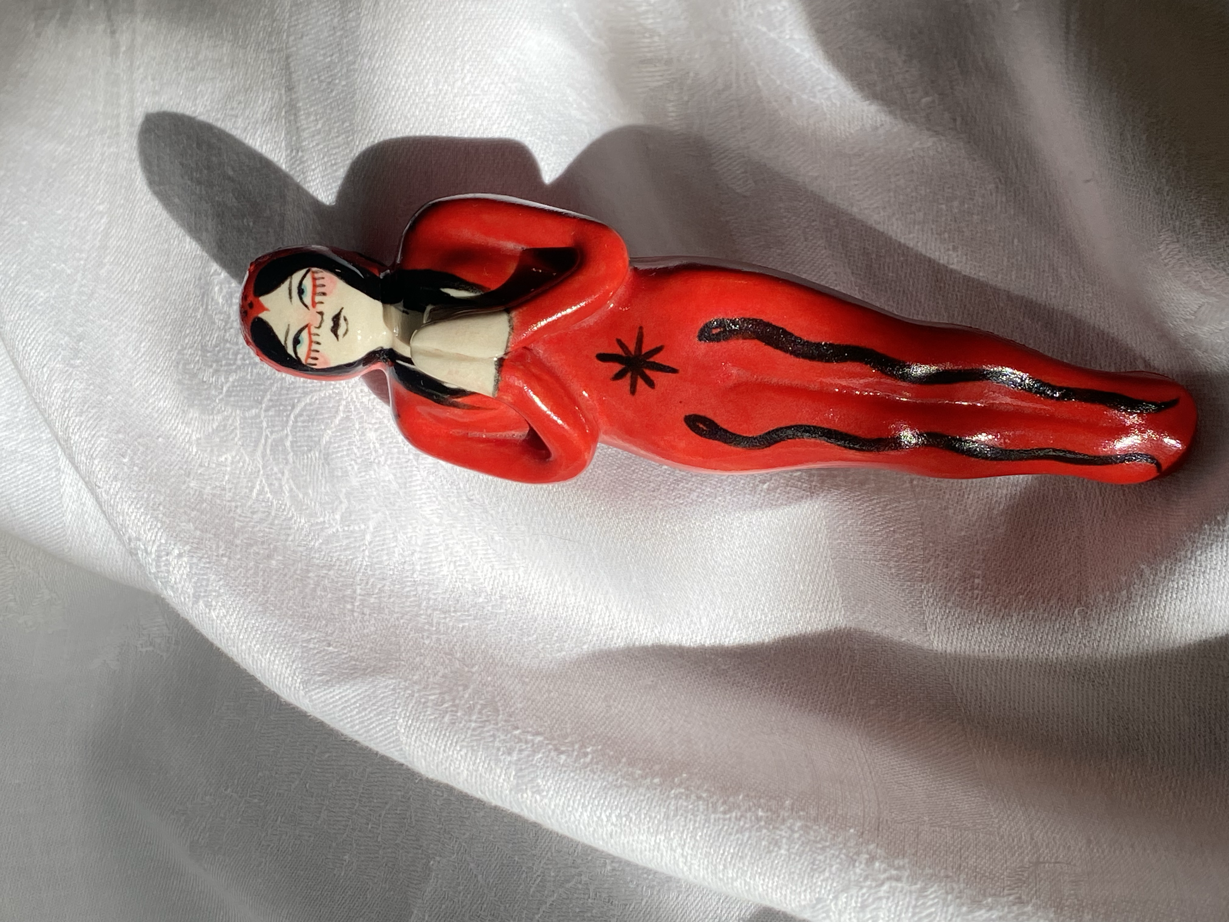Red Lady, 2025. 
Stoneware clay, underglaze, clear glaze.