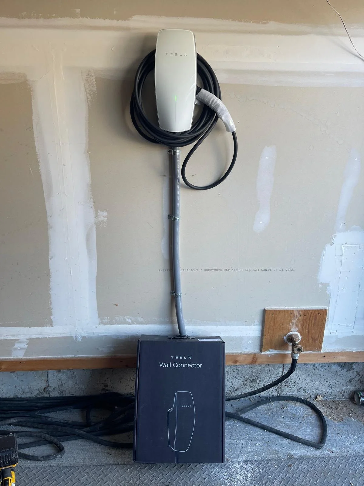 Tesla Wall Connector installed in an Ottawa home garage