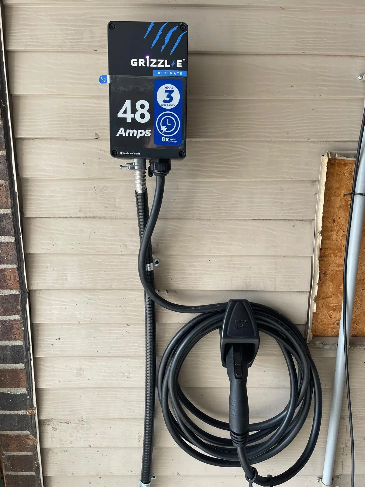 Black Grizzl-E EV charger installed for an Ottawa homeowner