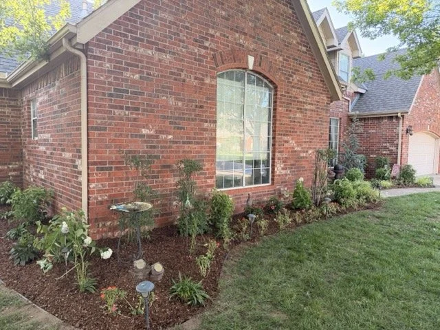 Landscaped front side of house in broken arrow