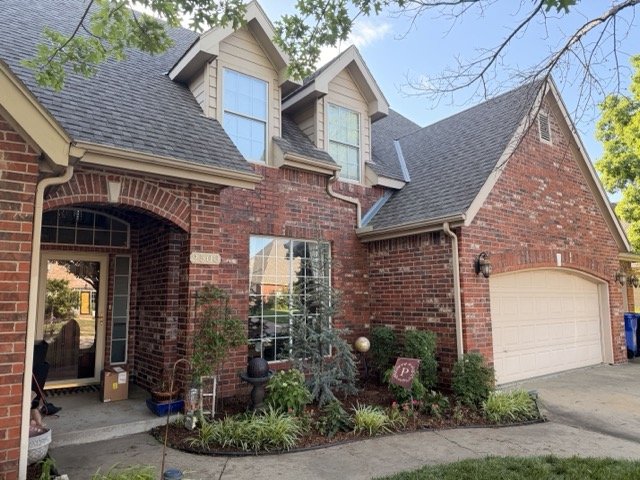 Landscaped front of house in broken arrow