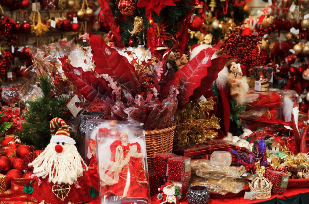 Commercial Christmas decor installation with luxury holiday displays and seasonal styling
