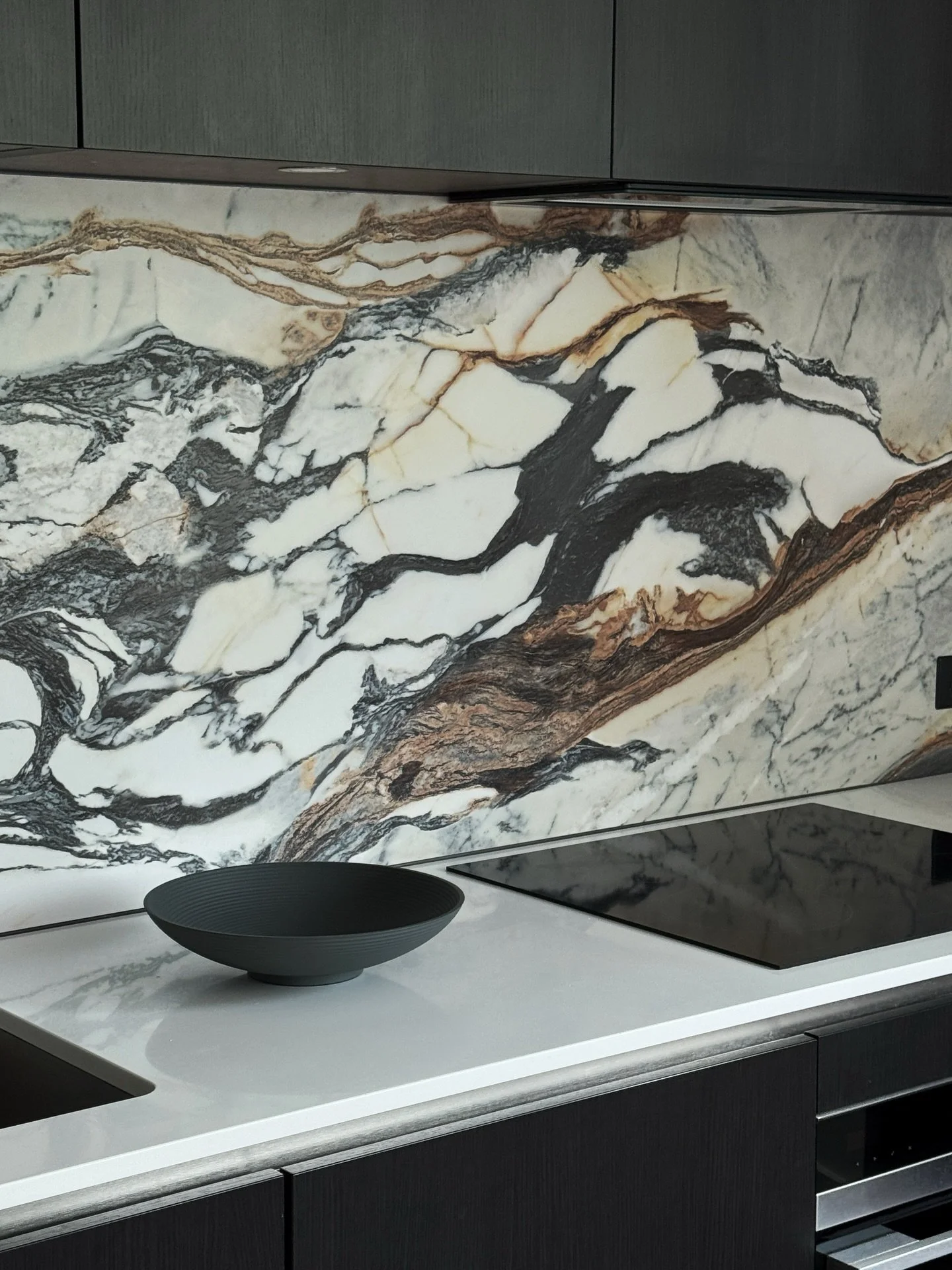 A kitchen splashback that quietly steals the show.

We recently completed this kitchen using a stunning large-format tile for the splashback - it&rsquo;s a detail we&rsquo;re loving more and more. Fewer grout lines create a cleaner, more seamless loo