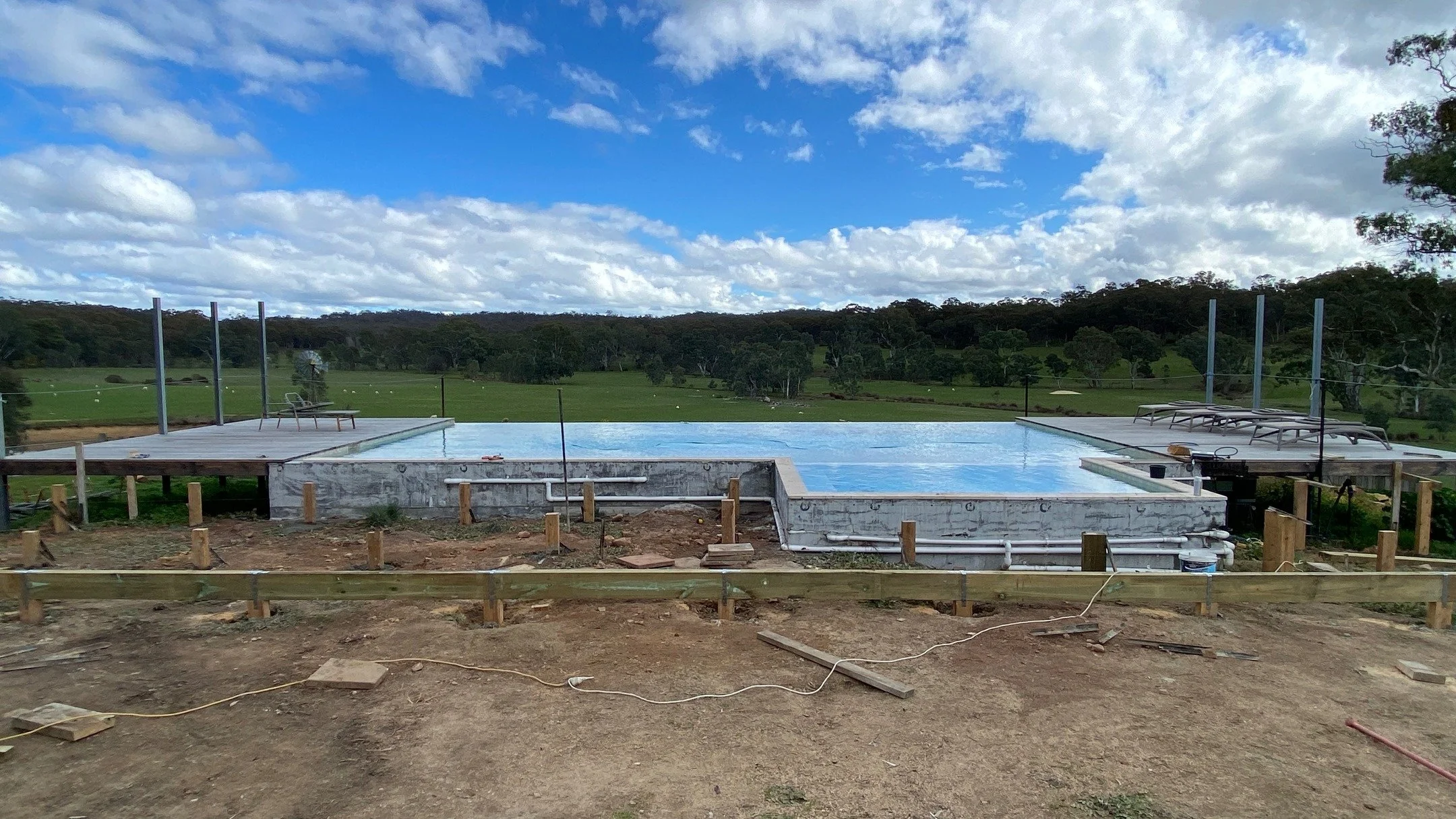 135sqm pool paving slab at this picturesque Yandoit property. Slab was suspended on Bondek up to the raised pool edge. Big Sky, great views, awesome clients and a friendly sheep that my daughter named Radish. What more could you ask for!? This slab w