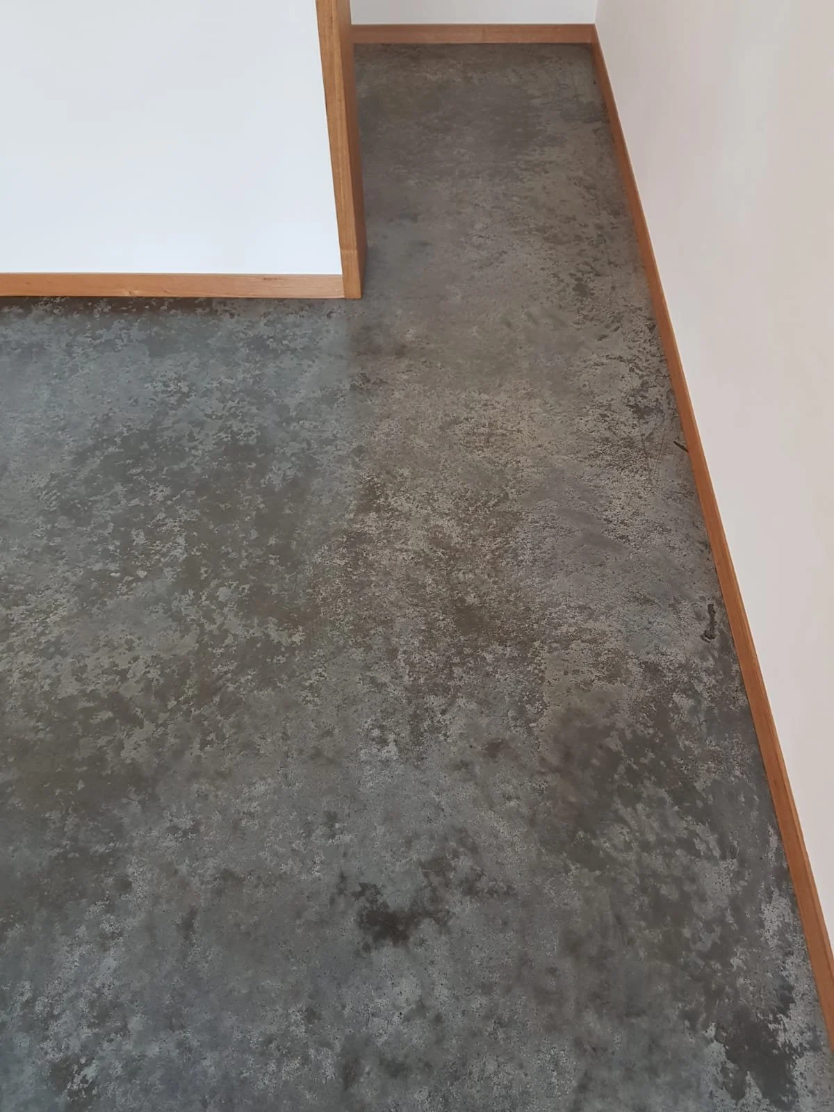 Close up of Burnished concrete finished with Livos oils