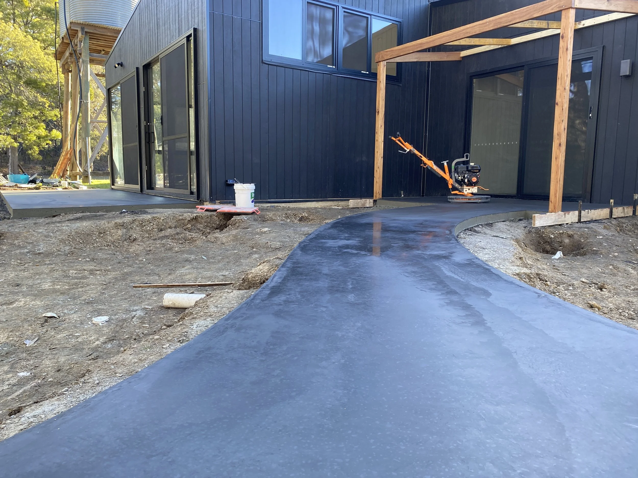 Burnished black concrete footpath
