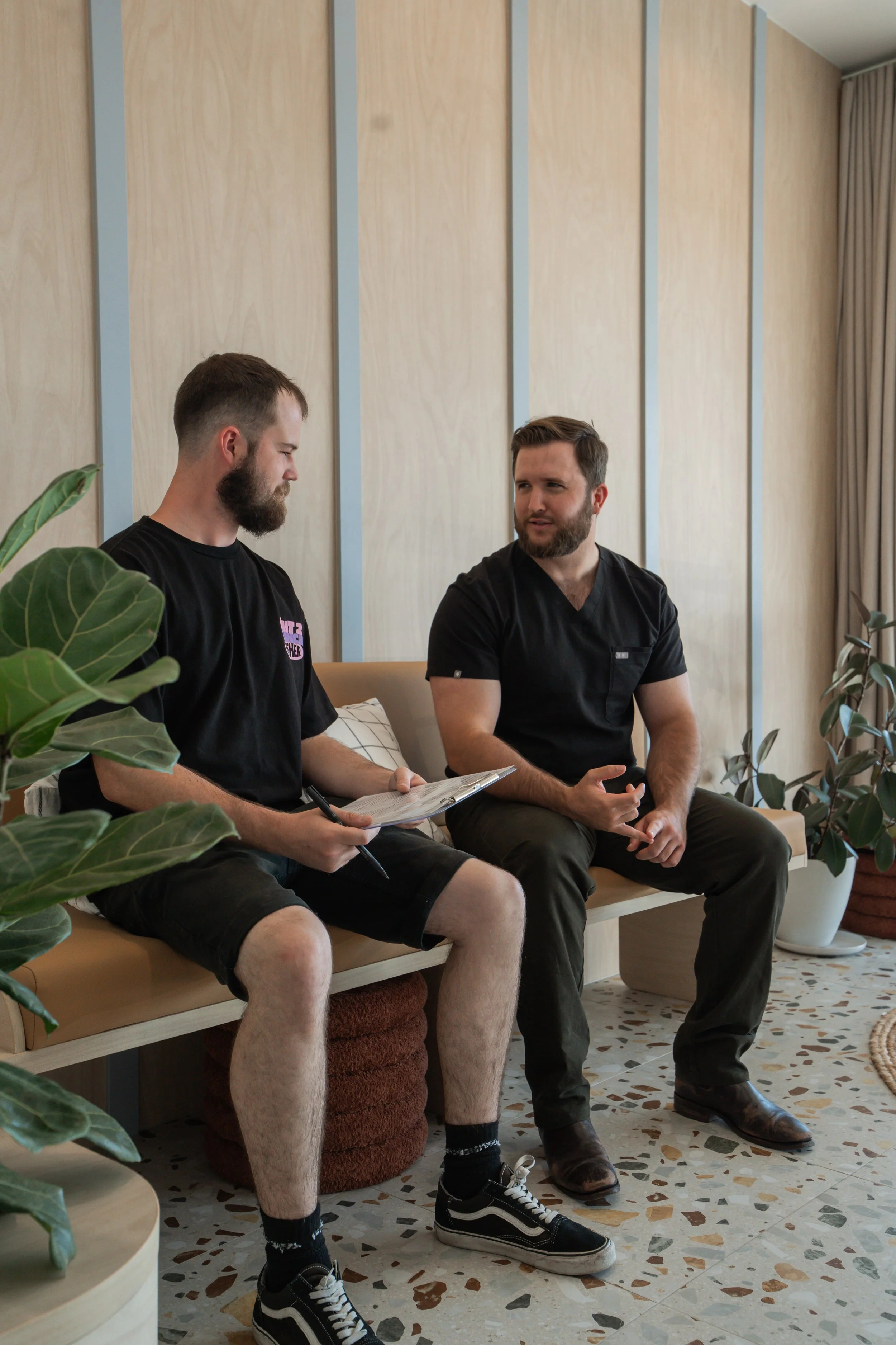Two males chatting