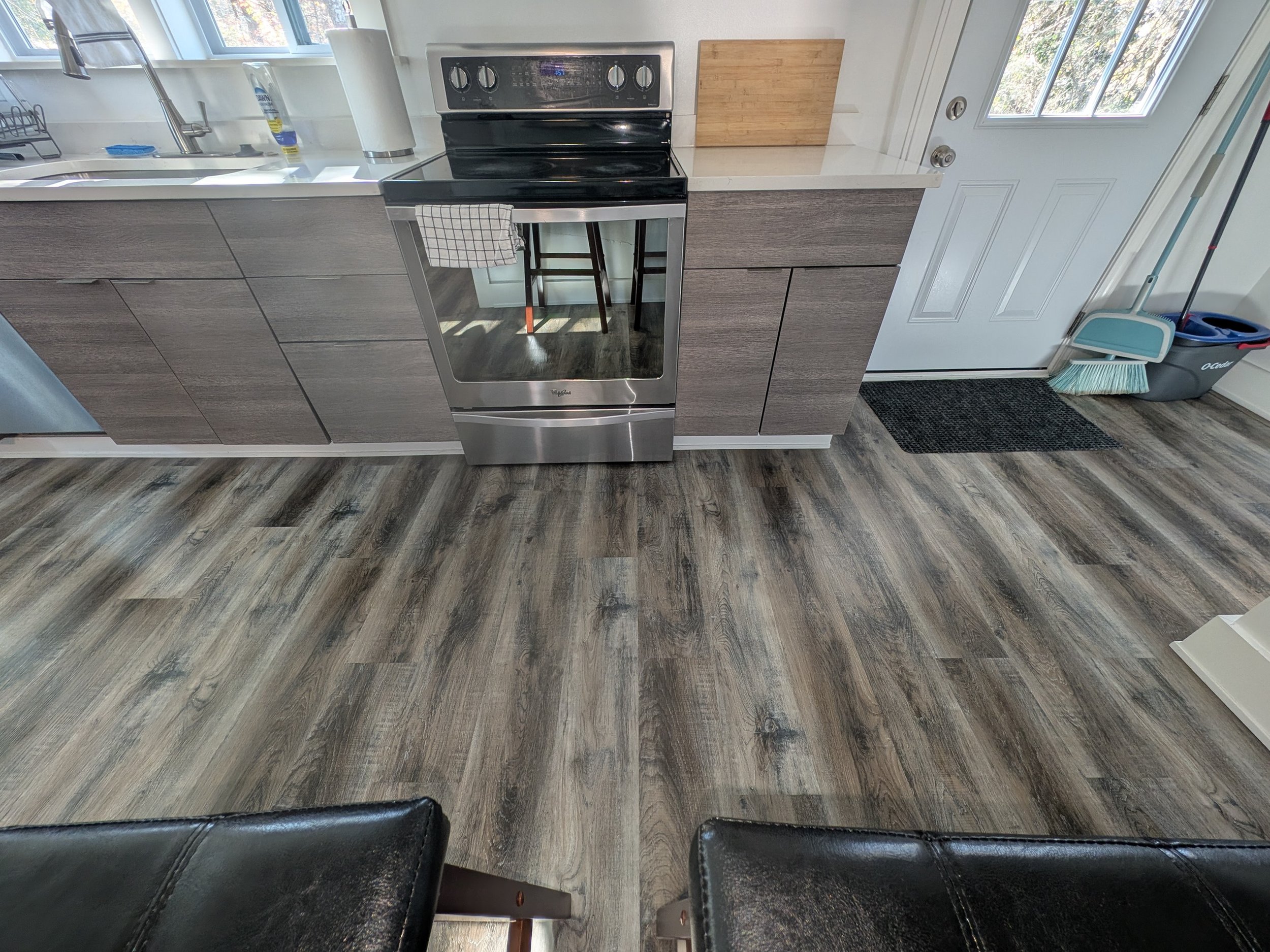 Mopping or vacuuming floors