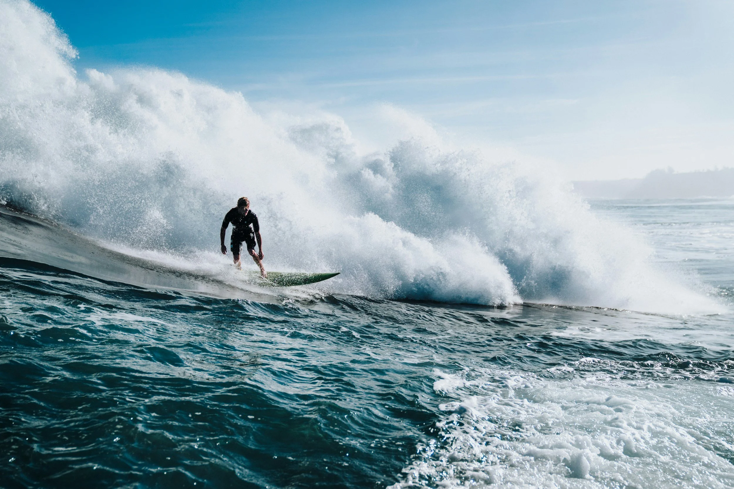 Person surfing to represent flexibility and leaving all or nothing thinking around food