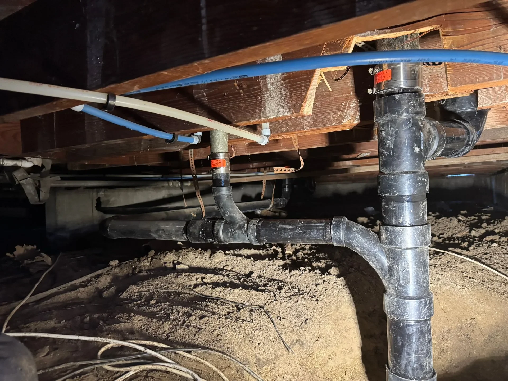 Sewer line repair under home crawlspace