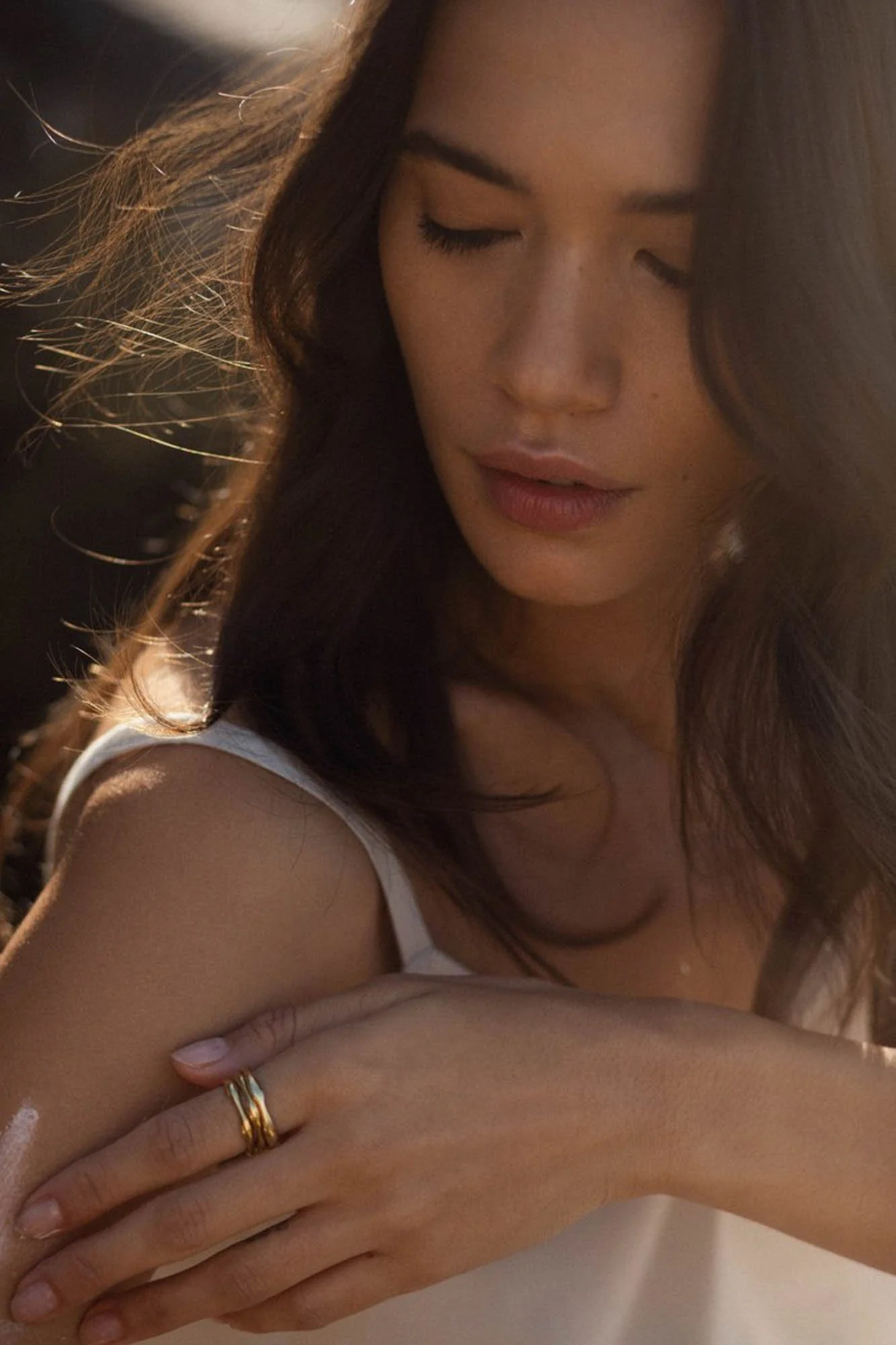 Soft effortless makeup look on a beautiful burnet model Sun kissed makeup look for a jewelry campaign by Vancouver makeup artist Atefeh