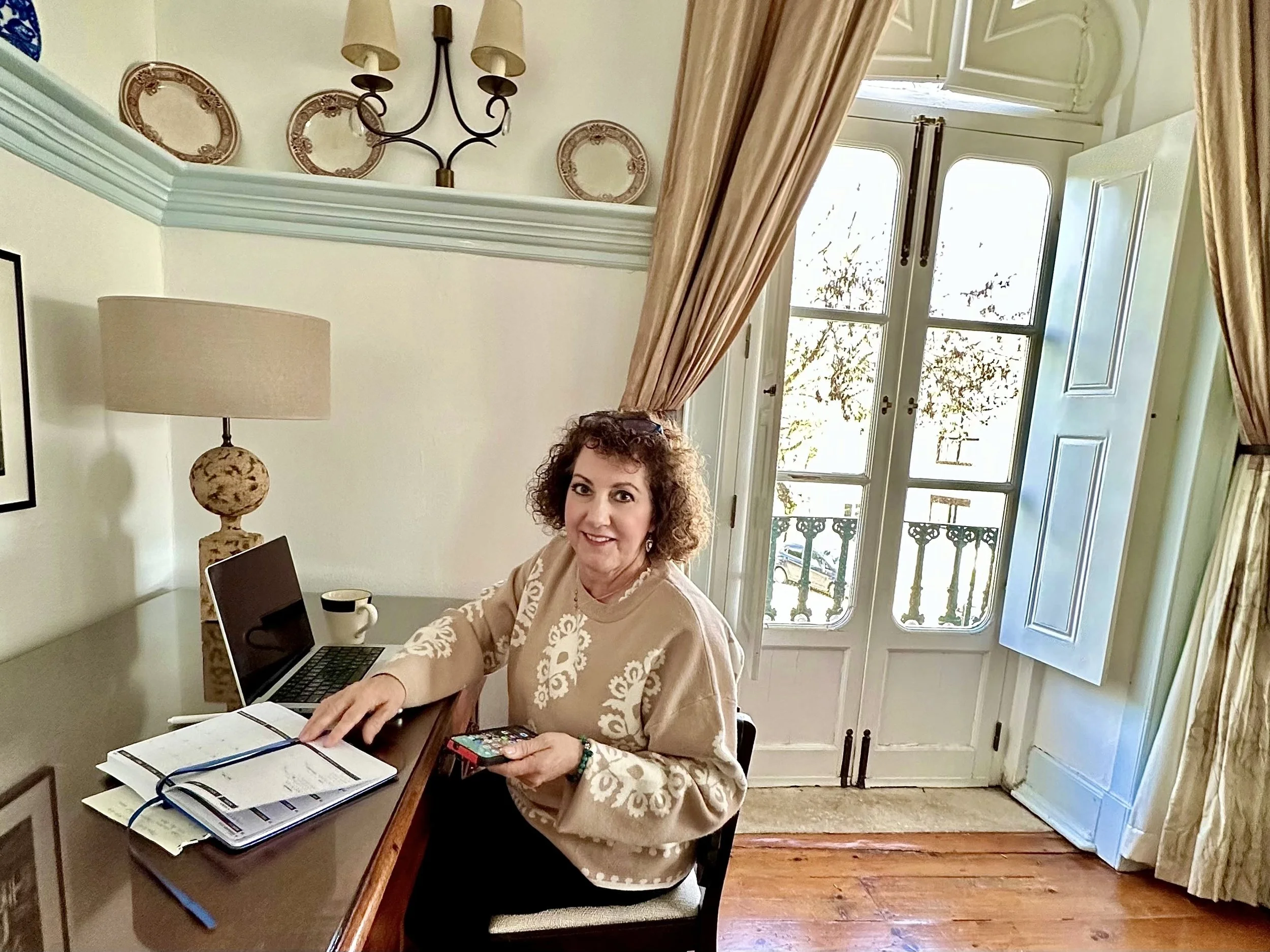 Luxury real estate broker Shannon Patterson working inside an elegant historic property, reflecting high-value acquisition and referral strategy