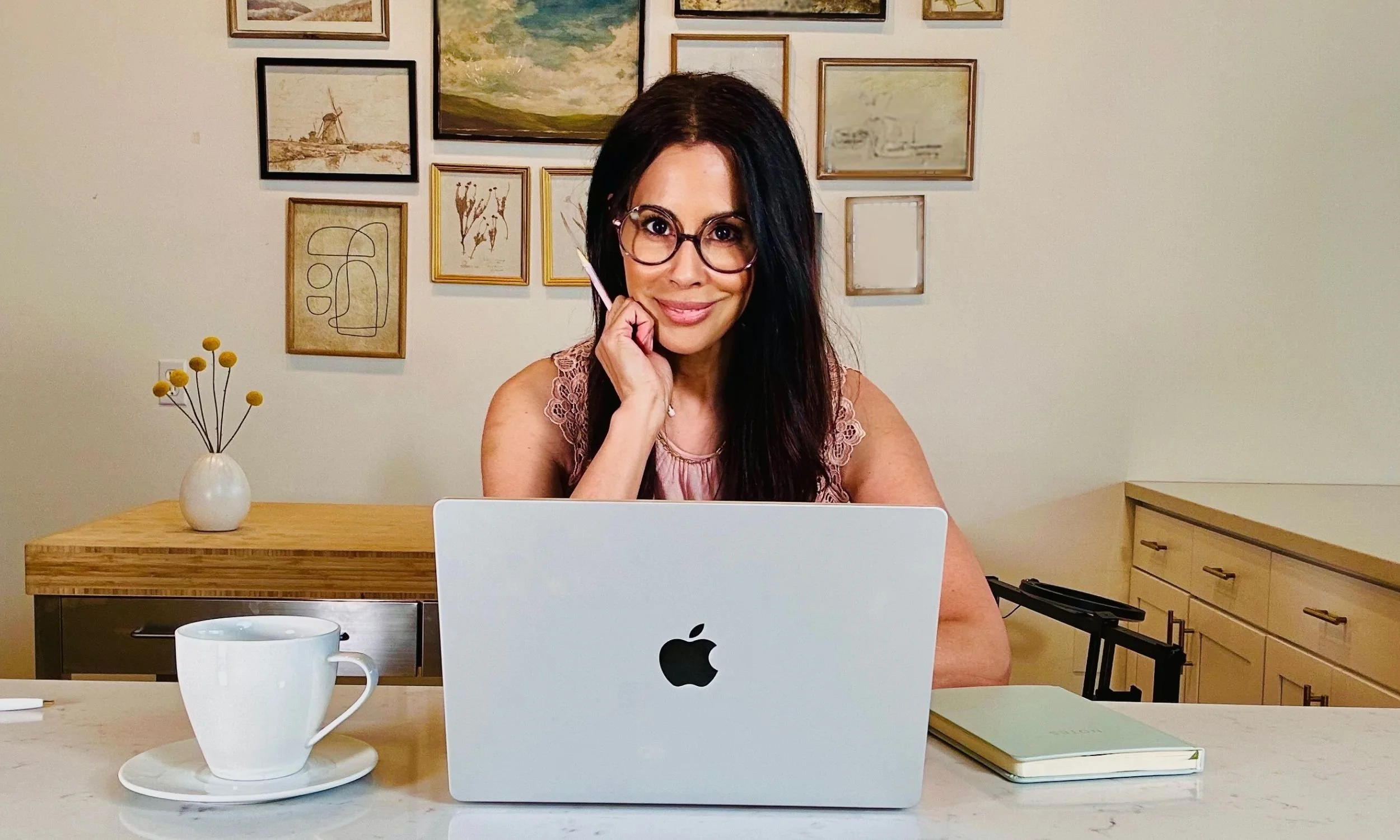 Melissa Maxwell, content strategist and copywriter, working on messaging and content strategy at a laptop