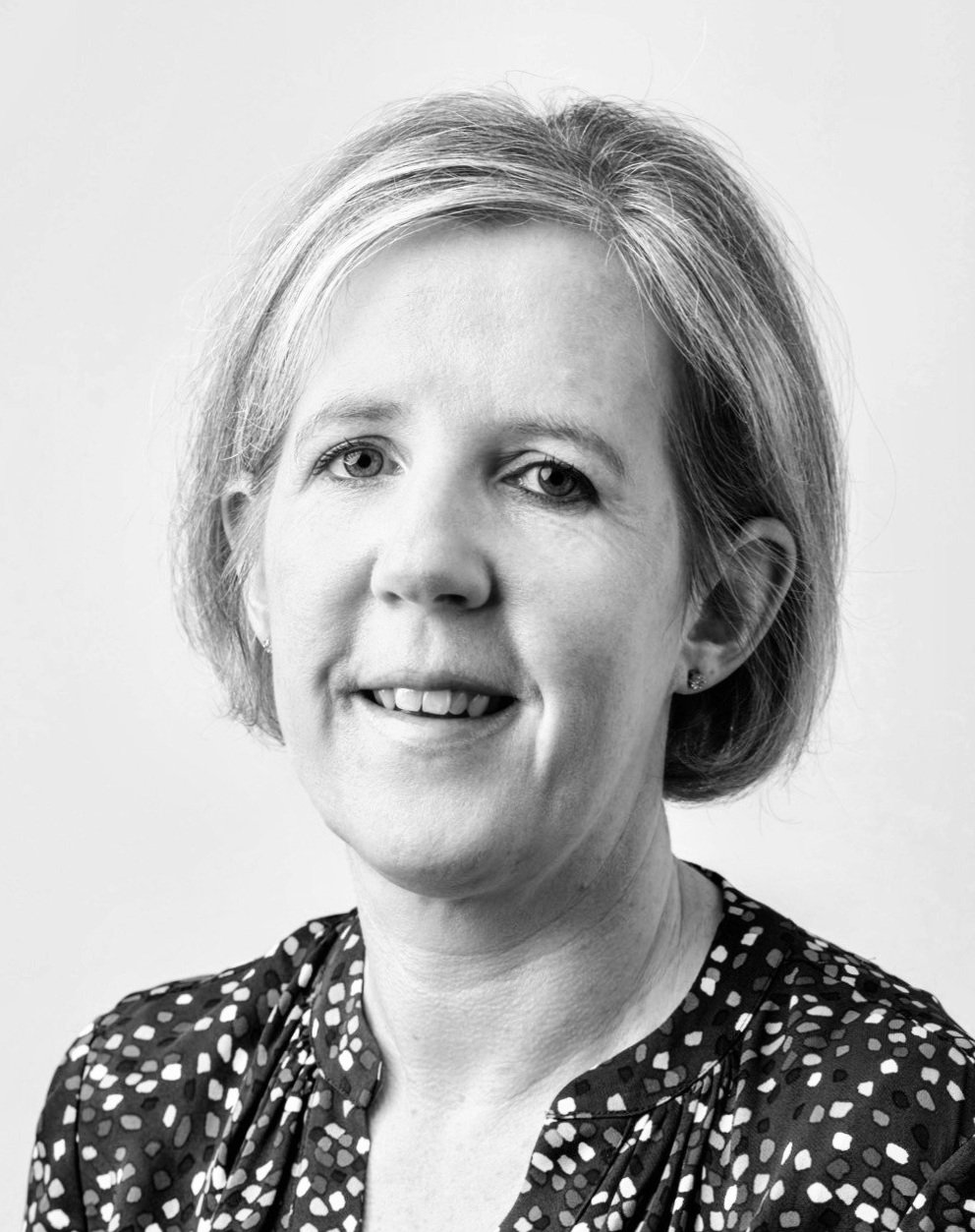 Black and white portrait of Claire Lyons, Managing Director of Claire Lyons Consulting