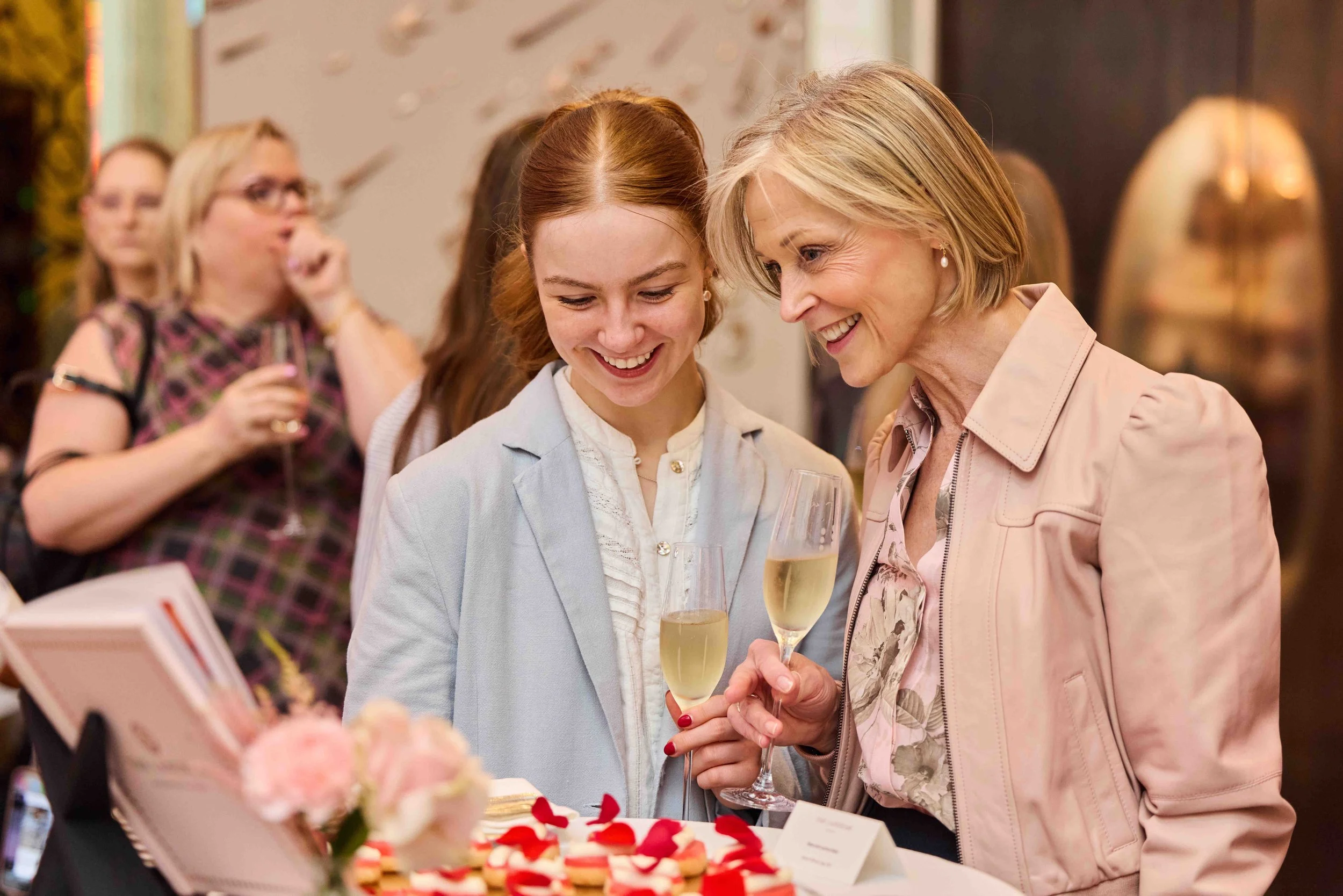 event-photography-london-book-launch-guests-browsing-display-langham.jpg