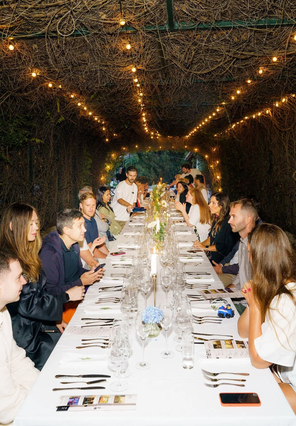 event-photography-lisbon-outdoor-dining-long-table-festoon-lights-nicolas.jpg