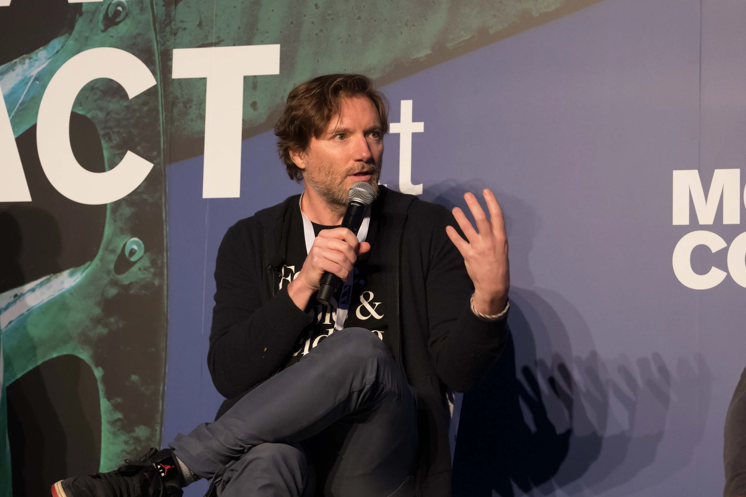 conference-photography-nyc-speaker-panel-discussion-stage-neil.jpg