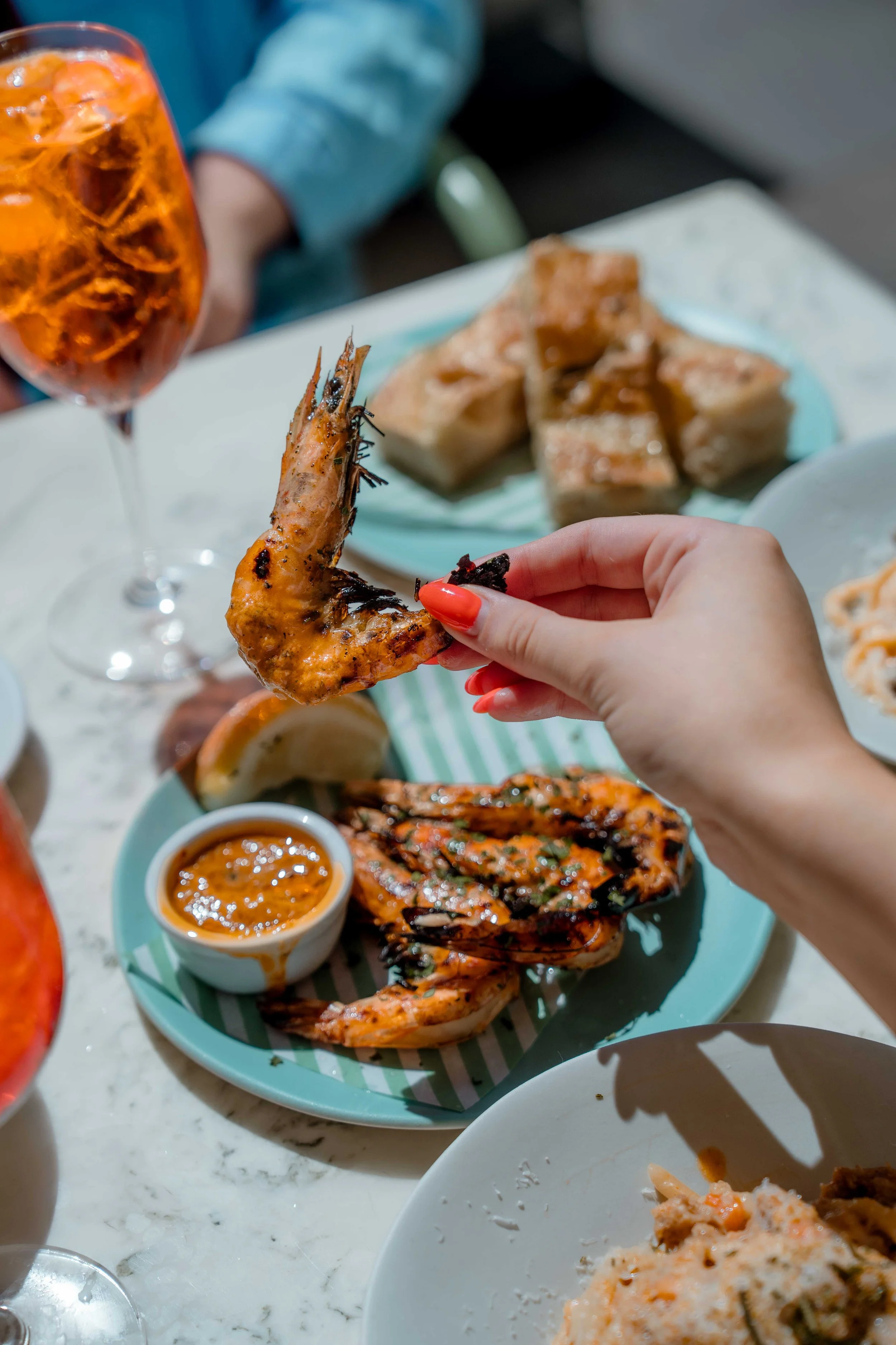 lifestyle-photography-guest-enjoying-restaurant-drink.jpg