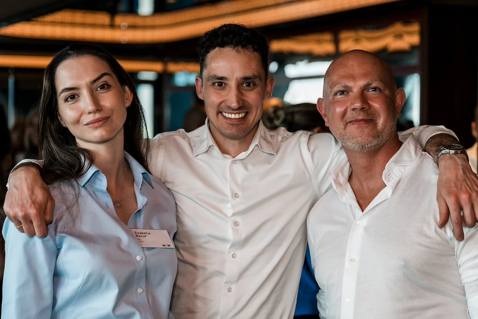  Delegates posing for a photograph during Money20/20 Europe. 