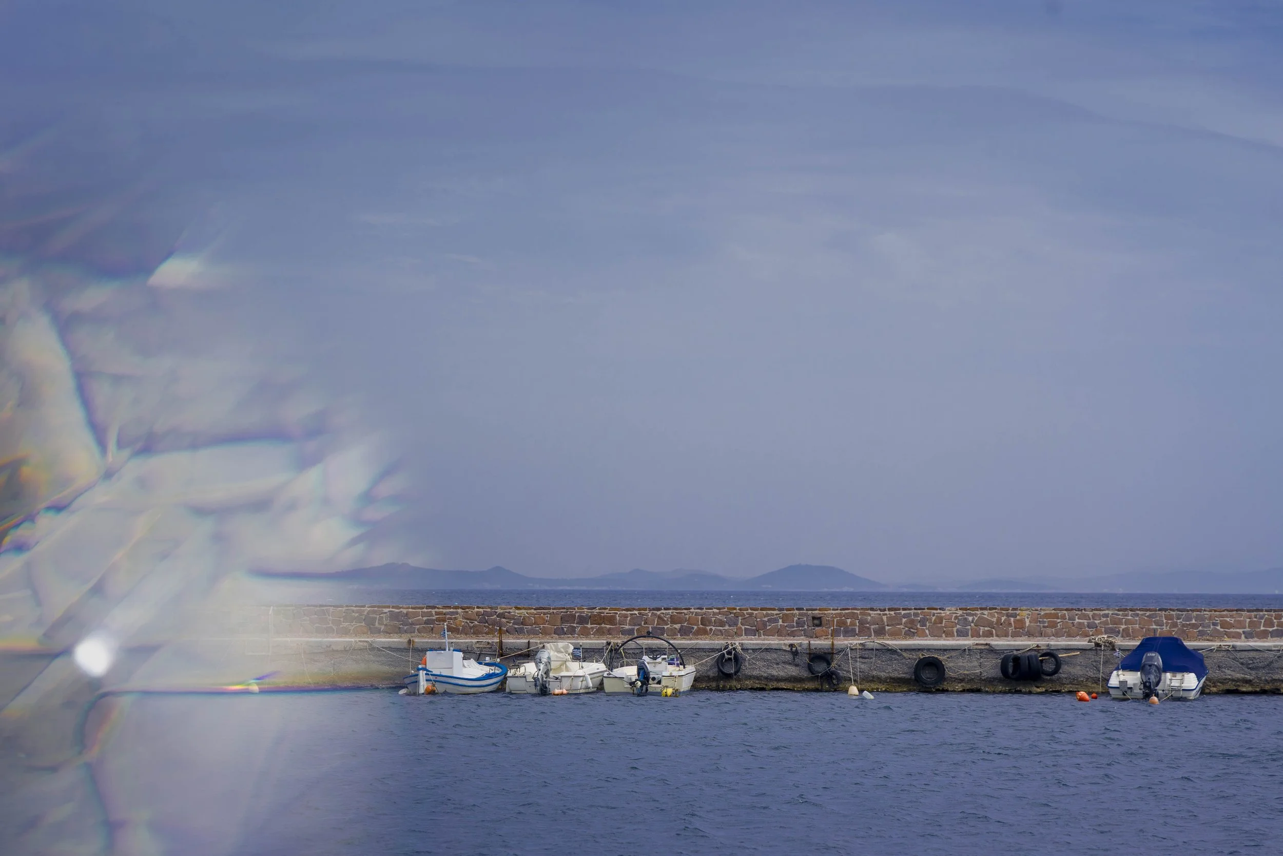 With tensions boiling over, the Port of Thermi was just one of the stages for the several attacks carried out by locals and far-right groups.
Here, on March 1, 2020, photojournalist Michael Trammer was brutally assaulted while documenting a crowd of 