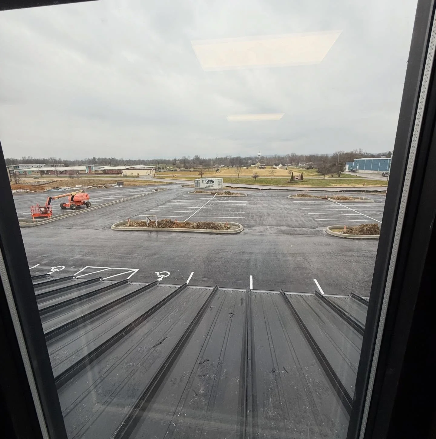 The new office is coming along! First layer of Black top down on the parking lot.