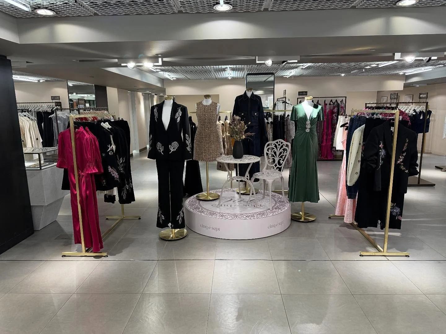We&rsquo;ve had the pleasure of working with @cinqasept and last week we installed this lovely display in @harrods womenswear department. We produced mdf vinyl wrapped circular base, powder coated garden furniture and brushed brass hanging rails and 