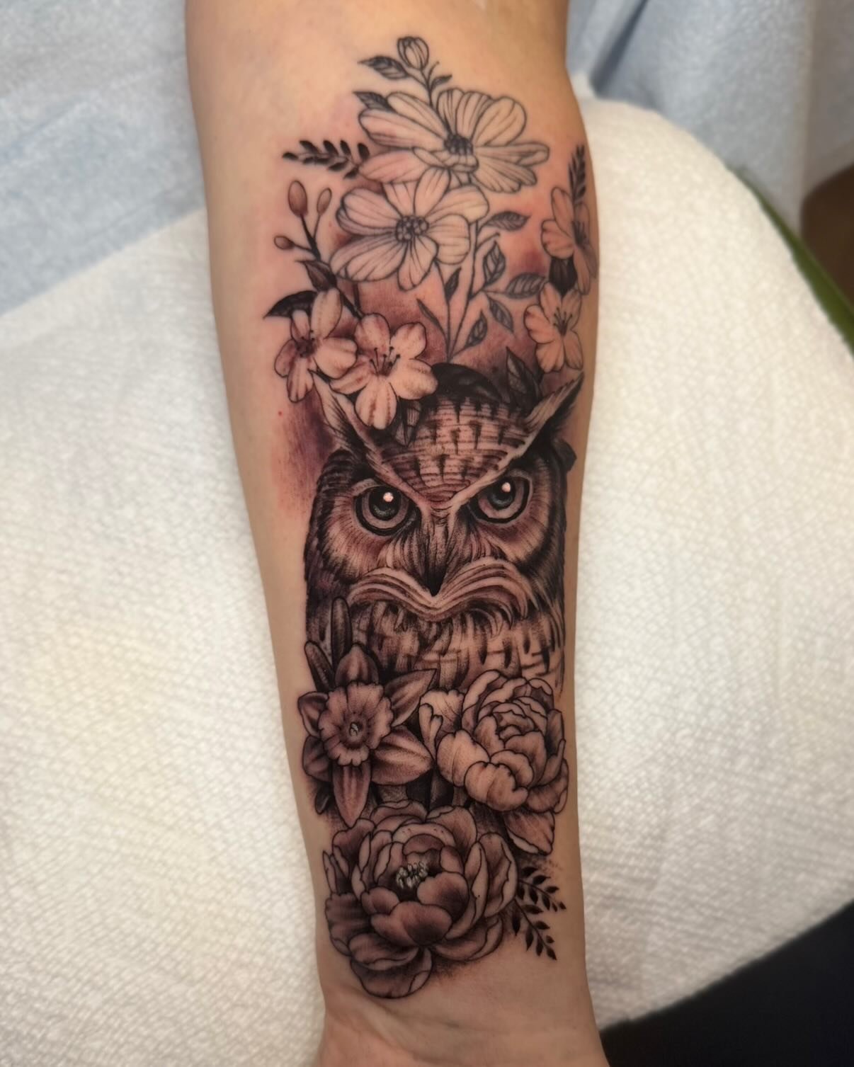 Covered an existing tattoo that I did and added more birth flowers around this super fun owl since I thought it fit in better that way. Thanks, yall! DM for appointments 🦉🦉 @tomorrow_tattoo #datway