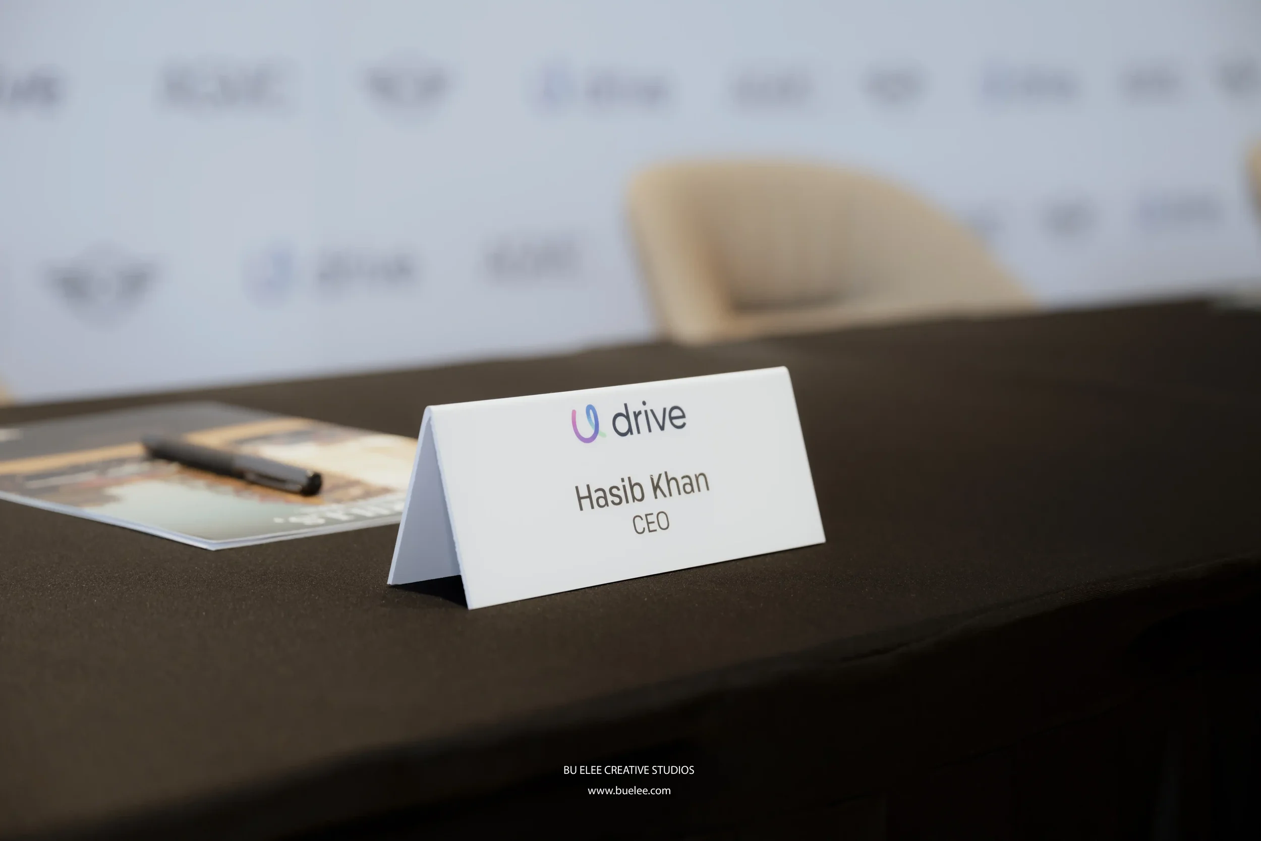  Name badge of Udrive’s CEO Haseeb in display at the signing ceremony with AGMC Motors Dubai, UAE.  