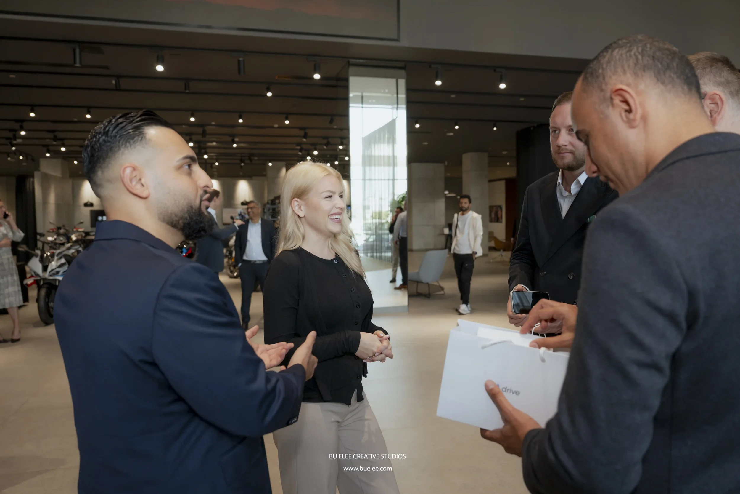  Networking moments between staff members of Udrive and AGMC Mini Cooper UAE.  