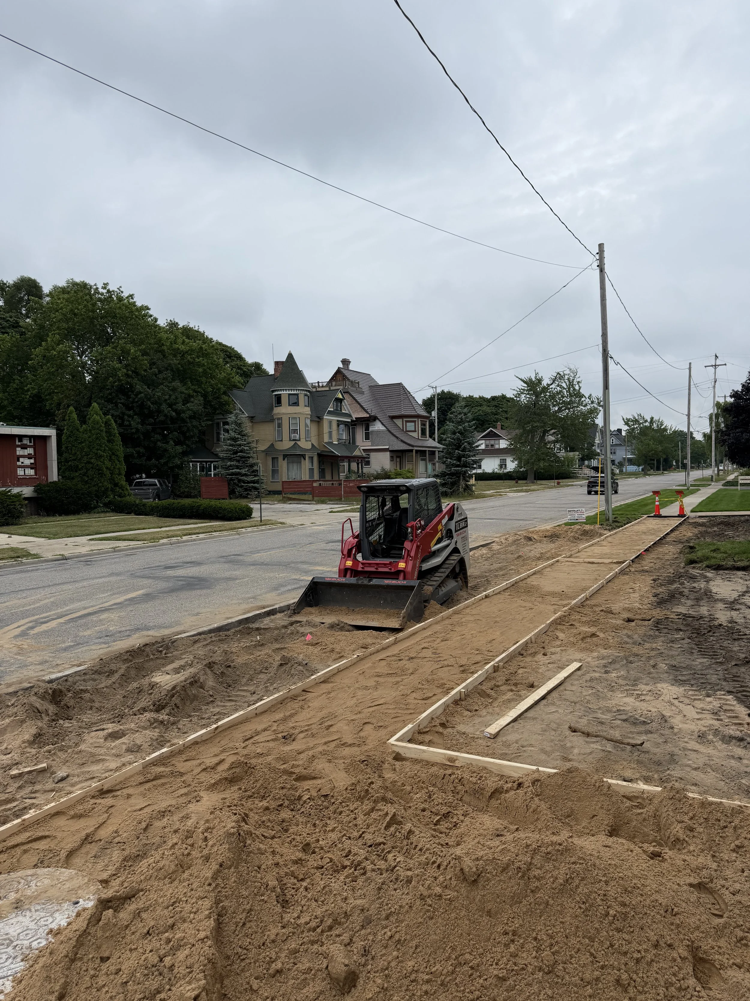 Prepping for sidewalk replacement in Muskegon Michigan