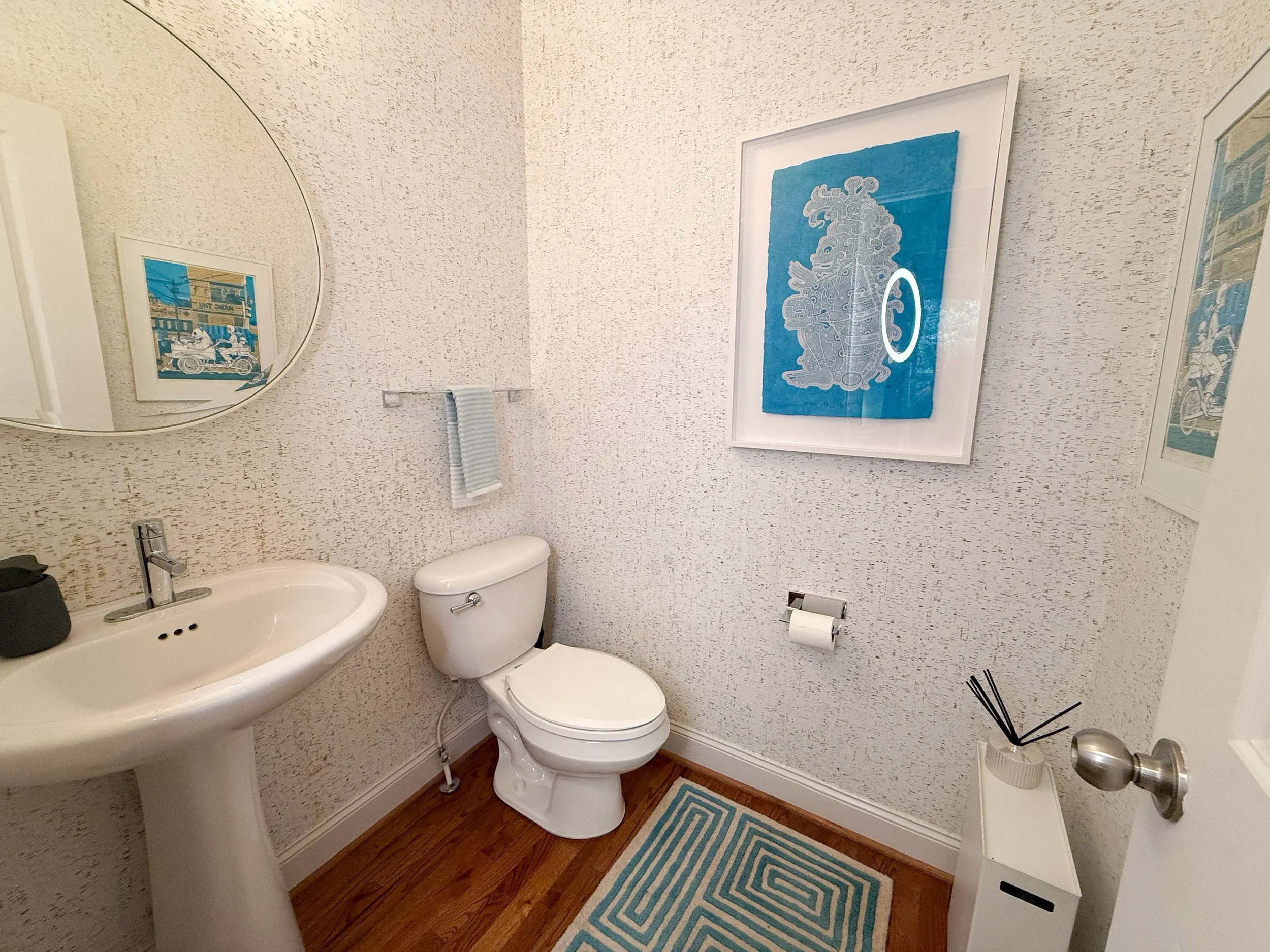 Powder bathroom with custom metallic cork wallpaper
