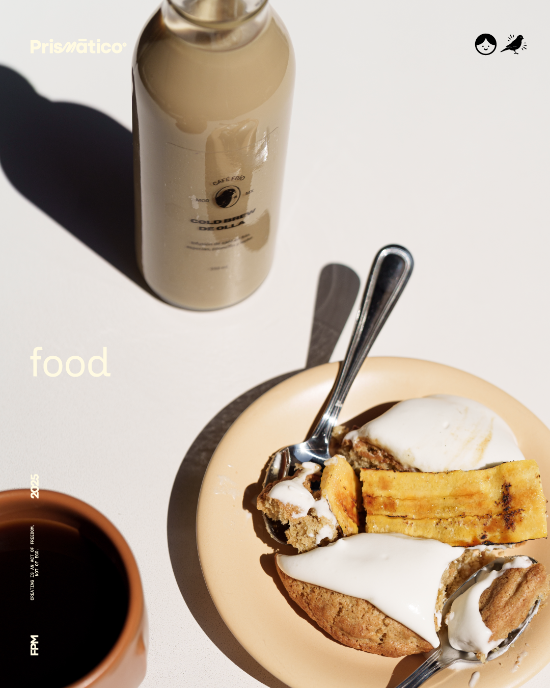 A beige plate with two slices of banana bread, a biscuit, and a scoop of vanilla ice cream, with a fork resting on the plate. A bottle of iced coffee and a cup of black coffee are on a white surface, with shadows cast by the sunlight.