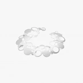 A necklace made of circular metallic links arranged in a loose circle on a white background.