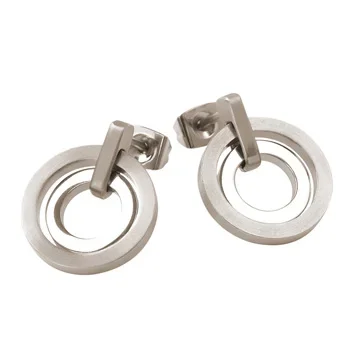 A pair of silver hoop earrings with a circular design.