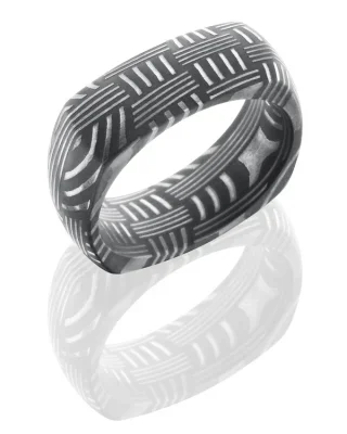 A patterned black and gray ring with geometric line designs.