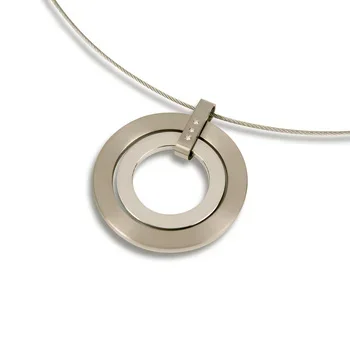 A silver circular pendant necklace with a double-ring design on a chain.