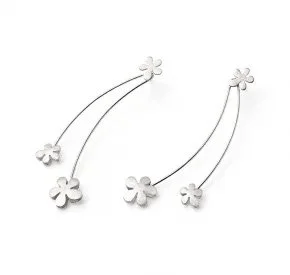 Three white metal hairpins with small flower-shaped decorations.