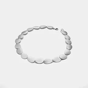 A silver necklace with large, flat, round links arranged in a circular shape on a white background.
