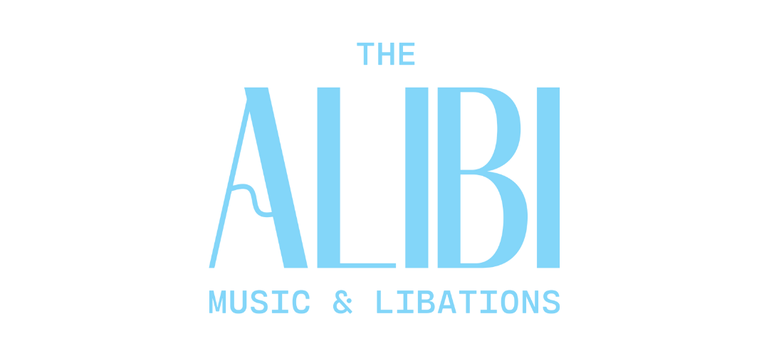 Logo for The Alibi Music & Libations featuring stylized text with "The Alibi" in large blue letters and "Music & Libations" in smaller blue letters underneath.