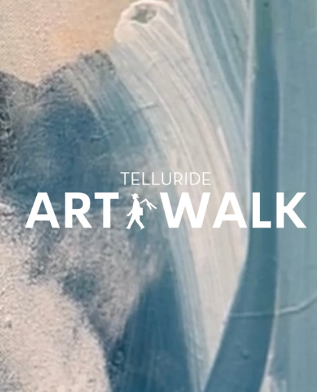 Artwork on a wall with the text "Telluride Art Walk" and a silhouette of a person carrying a paintbrush.