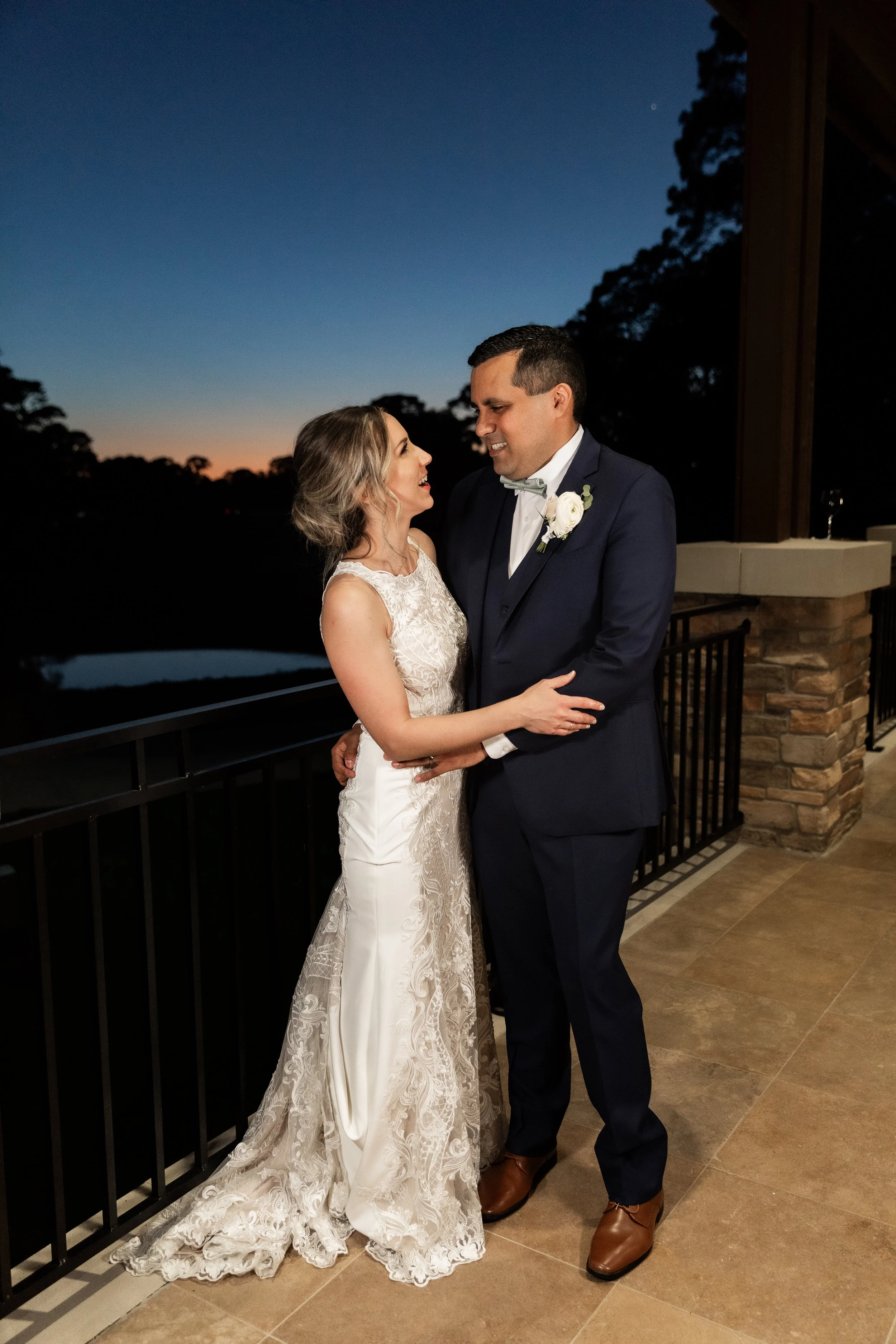 bride-and-groom-romantic-portrait-balcony-sunset-woodlands-county-club