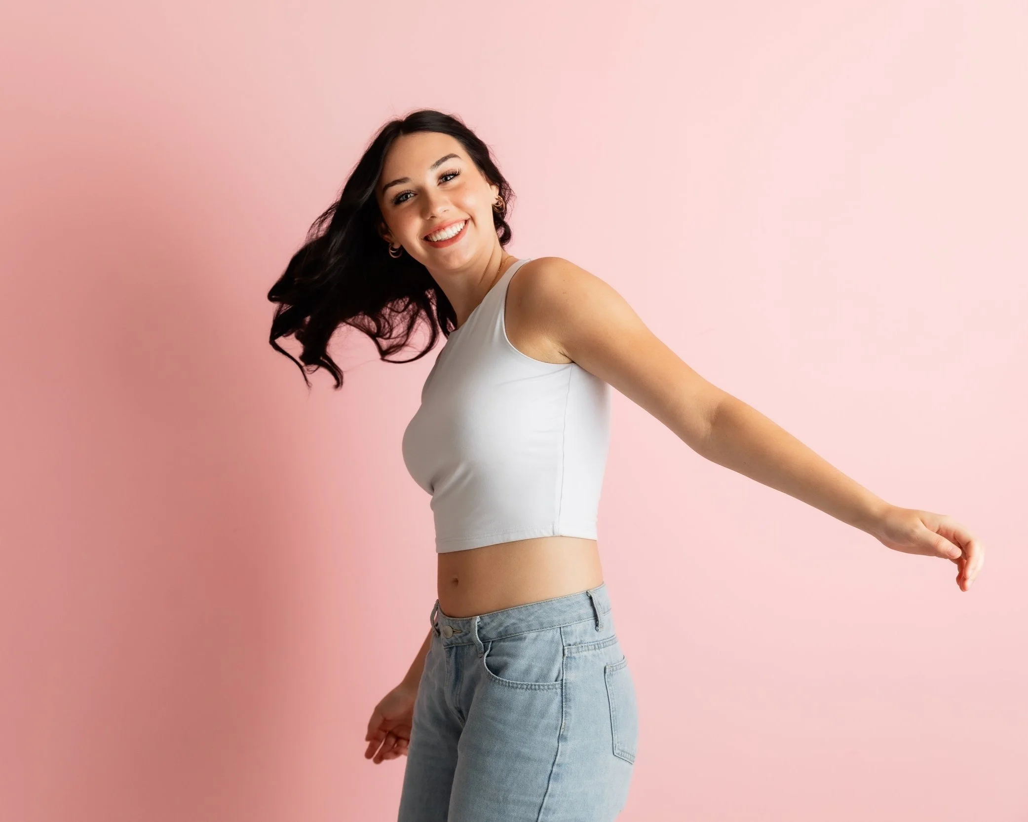 tomball-tx-senior-girl-portrait-in-studio-senior-session-fun-pink-background