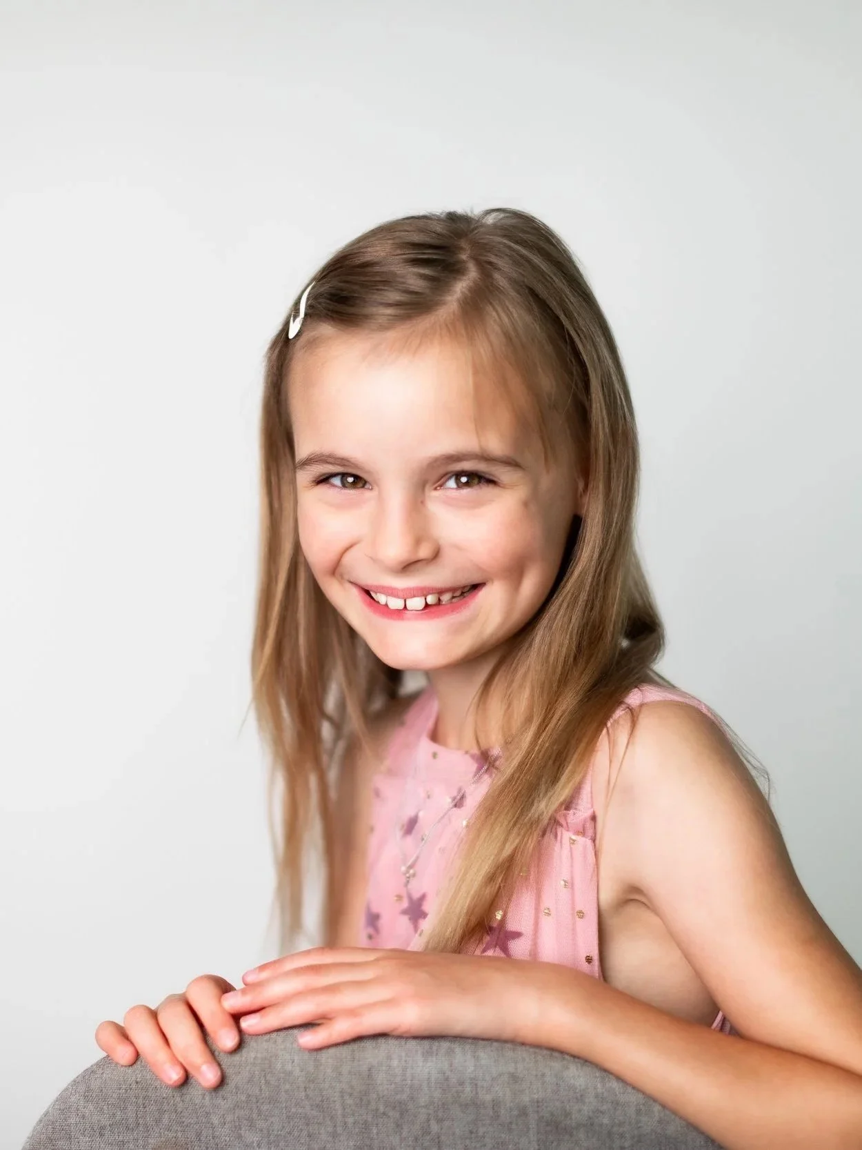 smiling-girl-bright-airy-studio-portrait-session-the-woodlands-tx