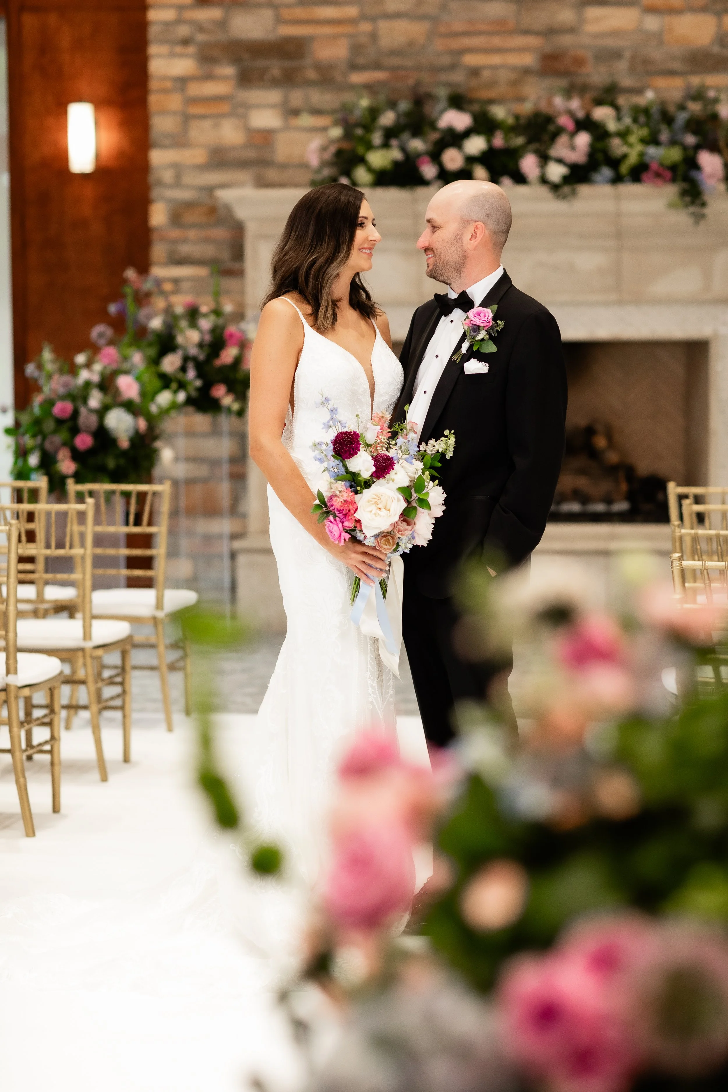 bride-groom-floral-mantle-ceremony-backdrop-woodlands-country-club